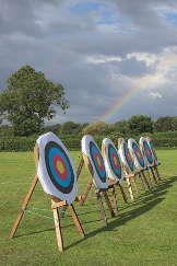 archery targets with a rainbow